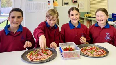 Students at Boisdale Consolidated School making healthy pizzas